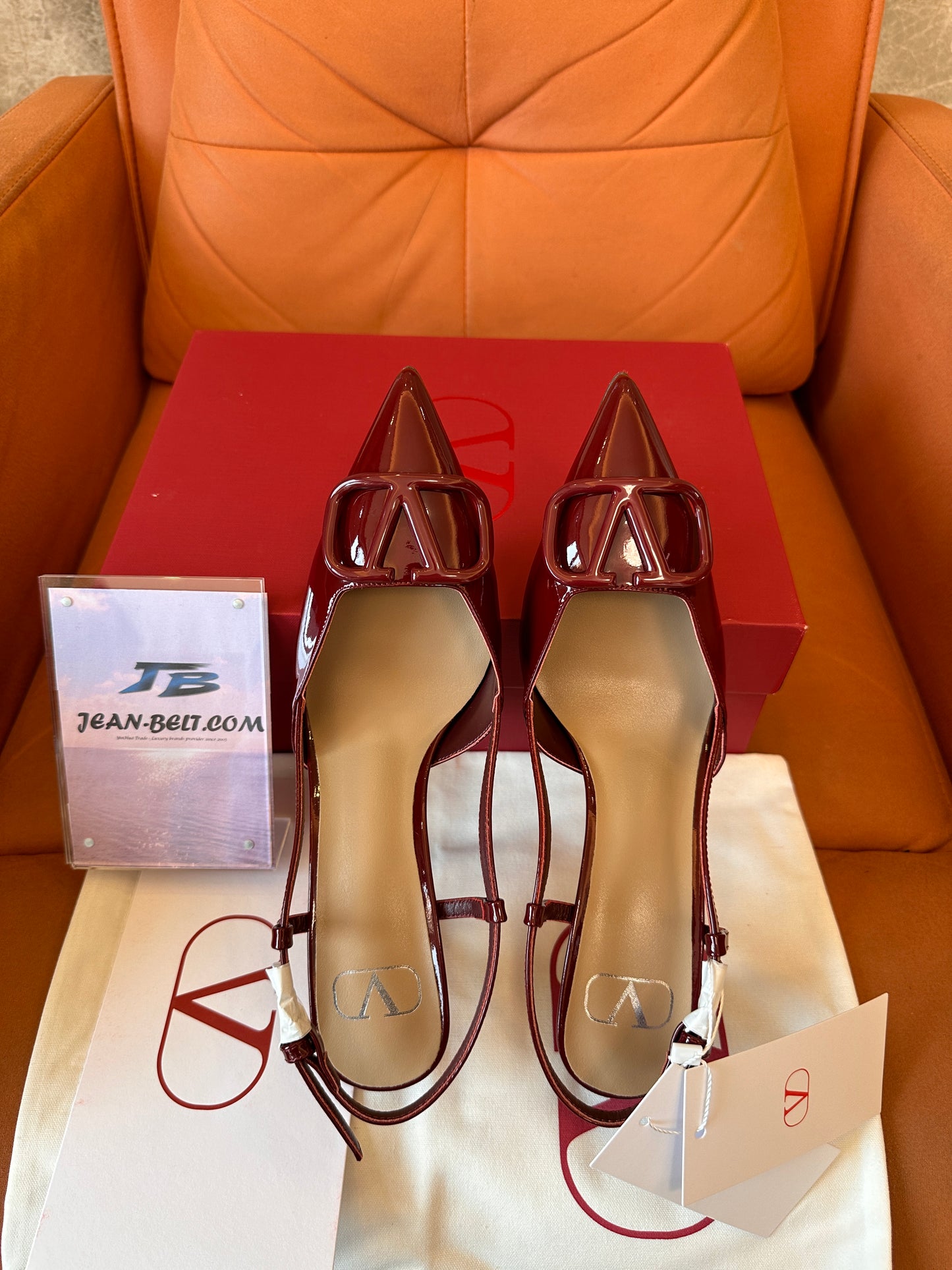 Valentino Garavani VLogo slingback pumps in burgundy patent leather