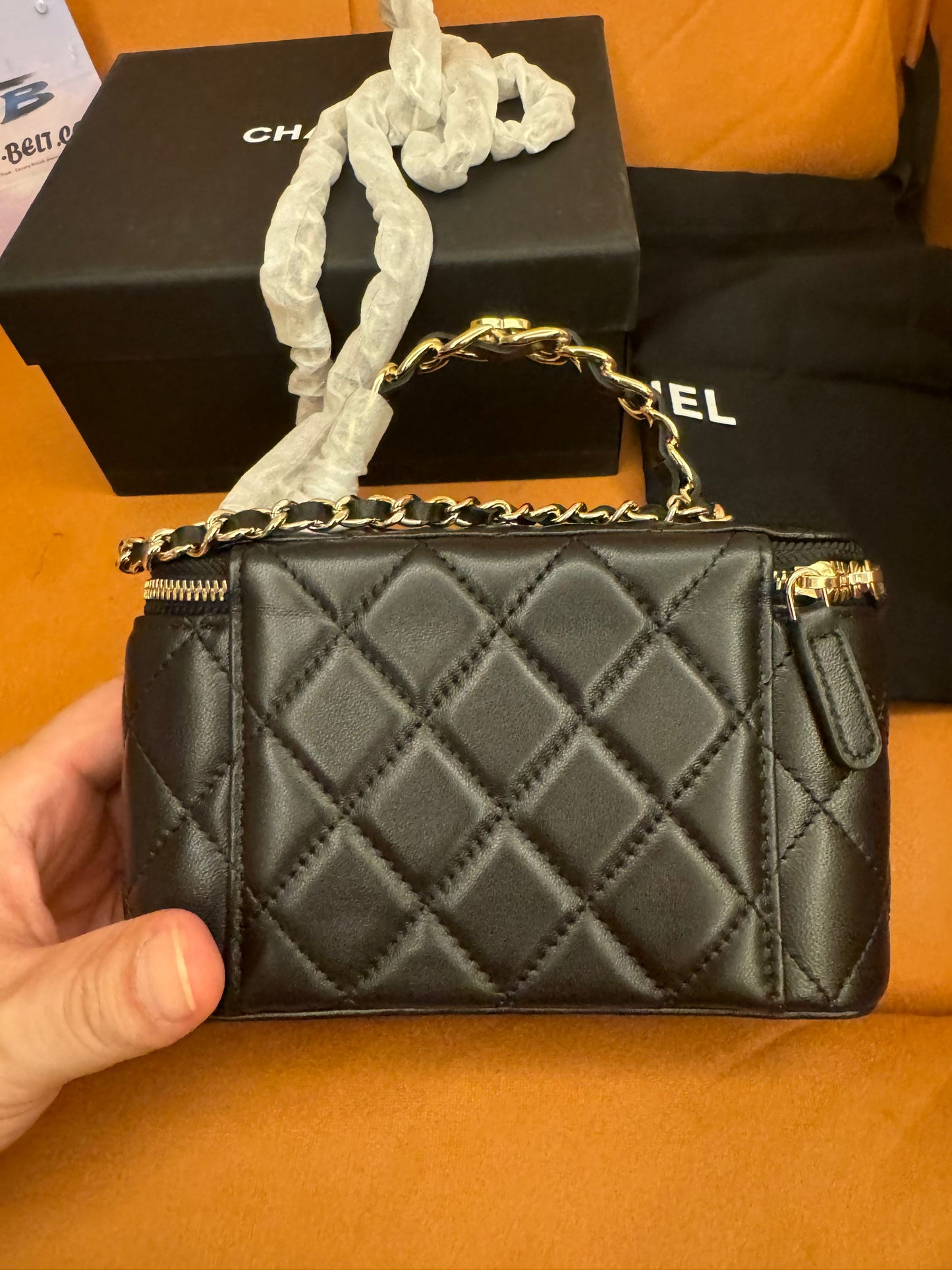 Chanel pick me up logo handle vantity case with chain quilted lambskin small cosmetic bag classic black