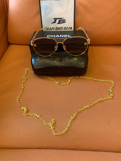 Chanel gold aviator sunglasses with chain accent