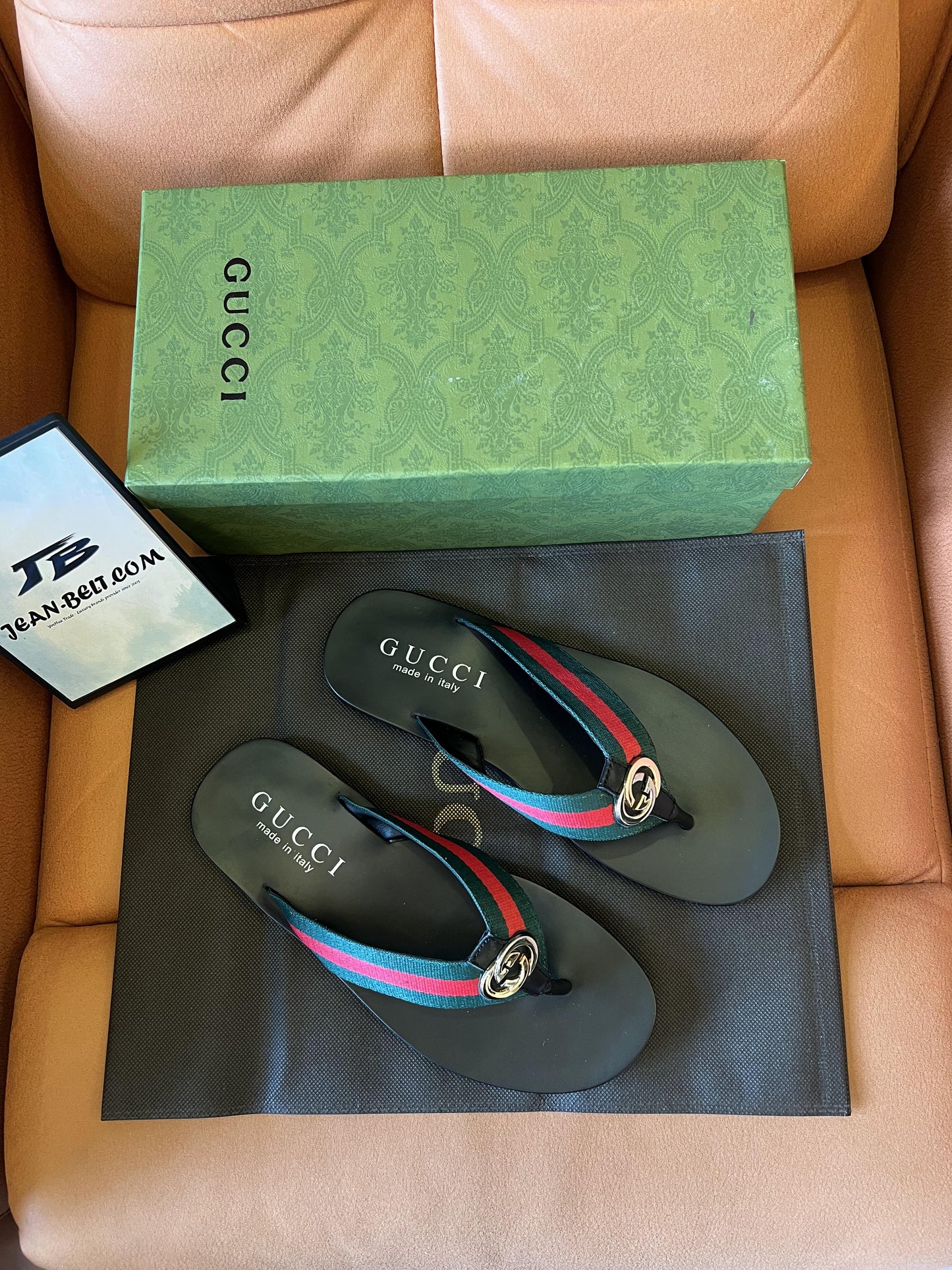 Gucci web flip flops