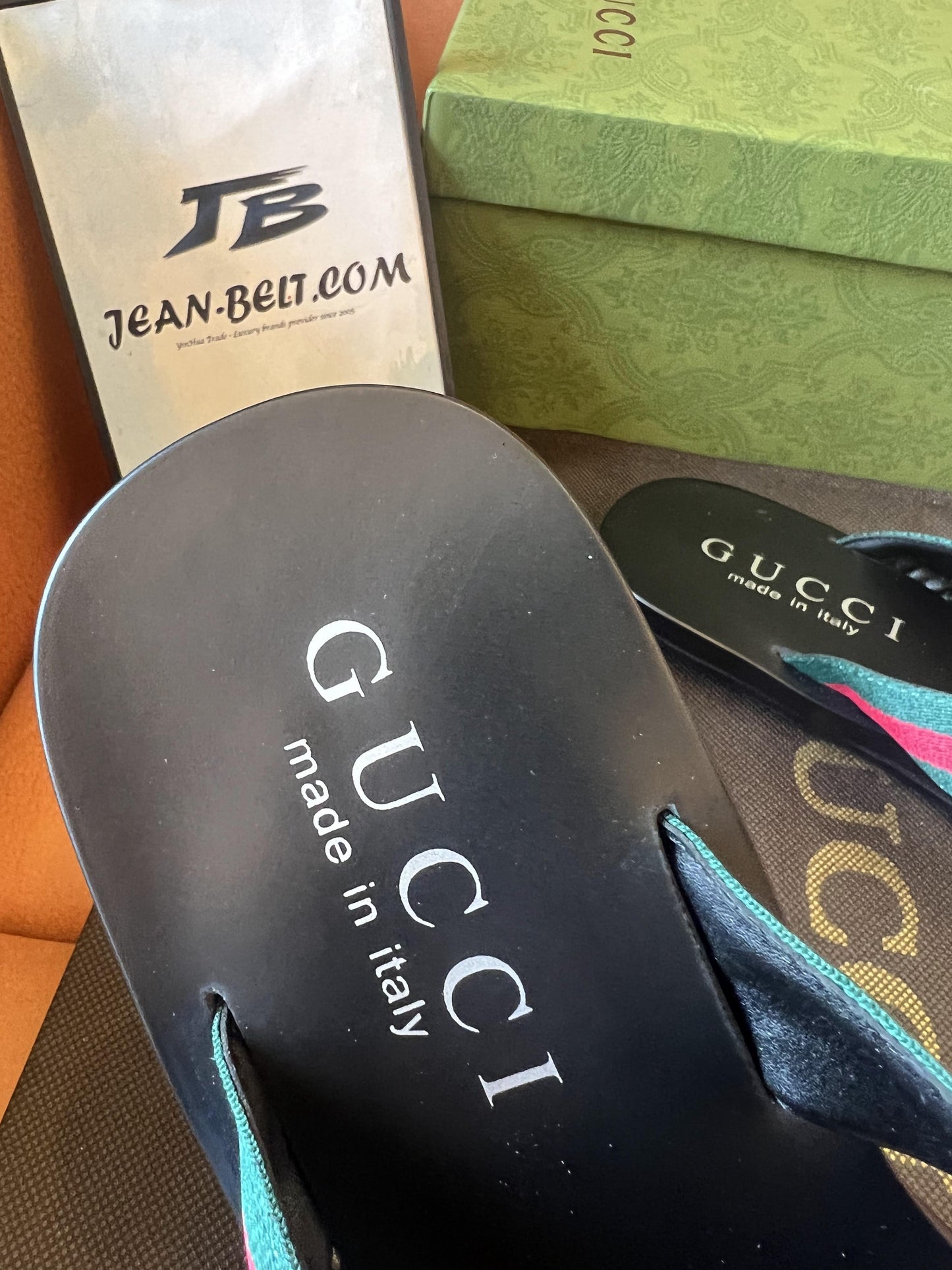 Gucci web flip flops