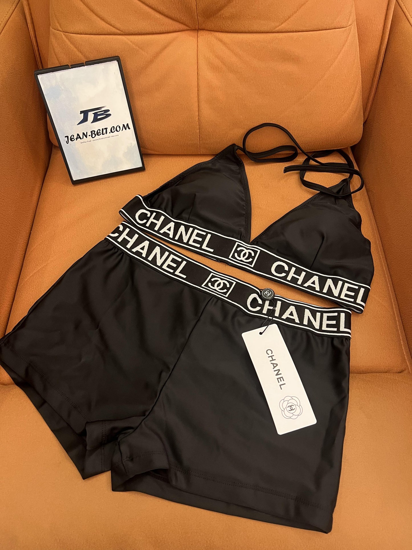 Chanel women's black swim set - triangle top and shorts