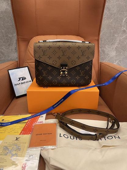 Louis Vuitton monogram reverse pochette metis