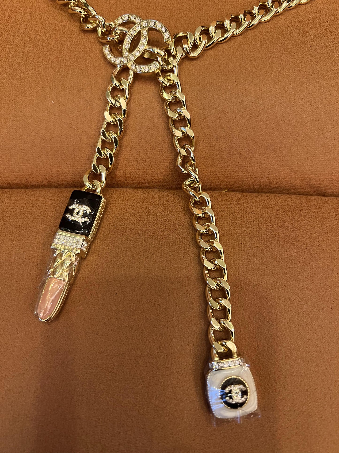 Chanel gold chain necklace with lipstick and perfume charms