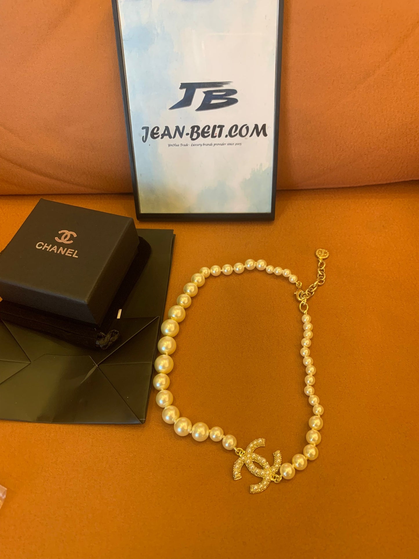 Chanel pearl necklace with signature CC pendant and crystal