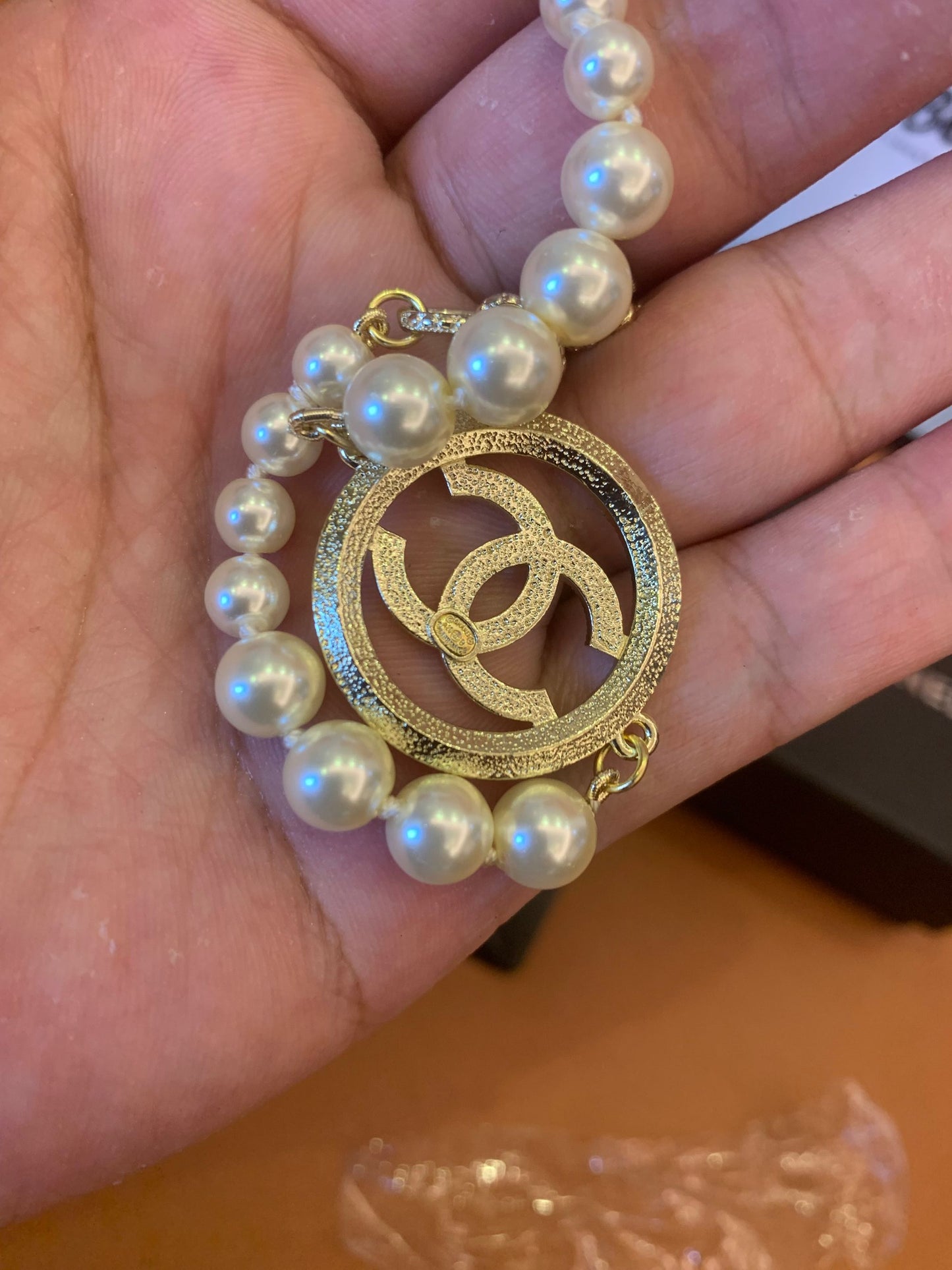 Chanel pearl bracelet with CC crystal pendant