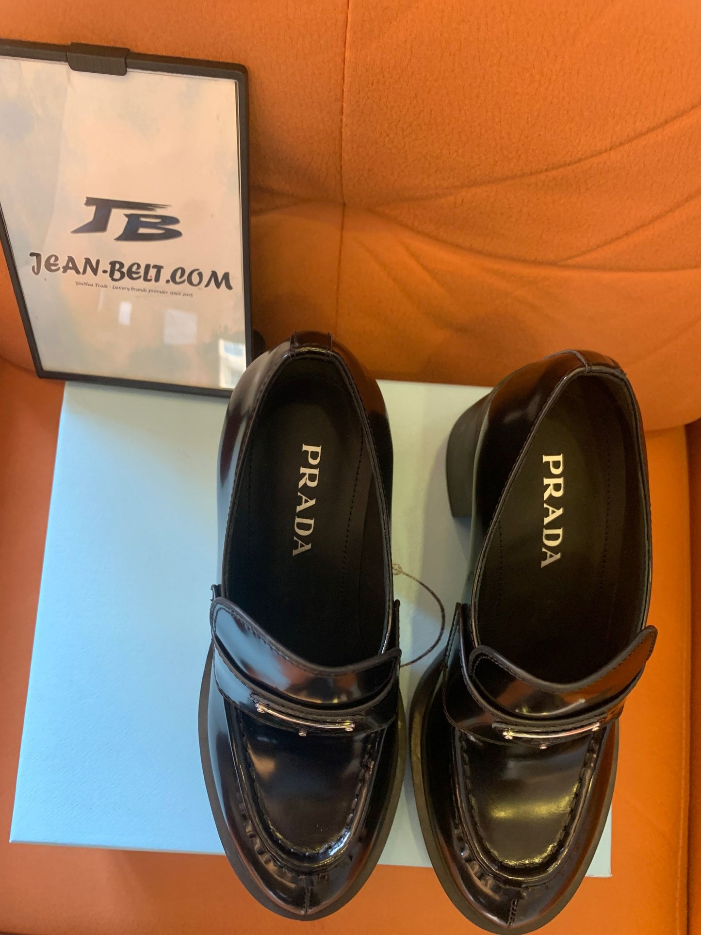 Prada logo-plaque leather heeled loafers