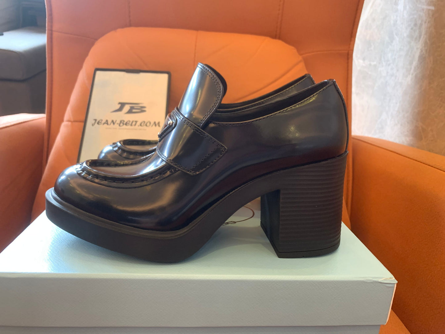 Prada logo-plaque leather heeled loafers