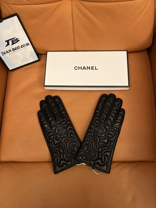 Chanel black lambskin leather gloves with quilted camellia design