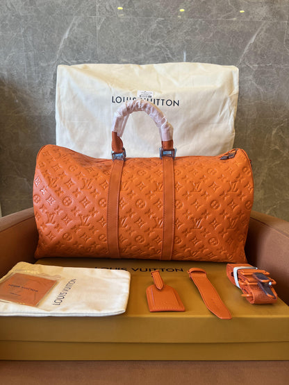 Louis Vuitton keepall bandouliere 50 orange weekend travel bag