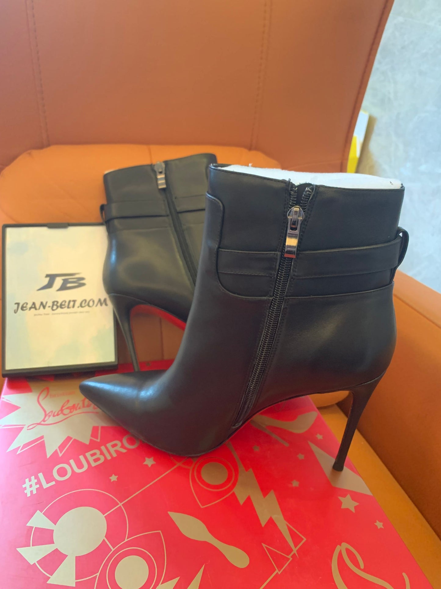 Christian Louboutin black lock So Kate boots