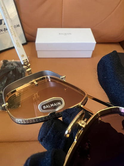 Balmain Paris x Akoni gold aviator sunglasses