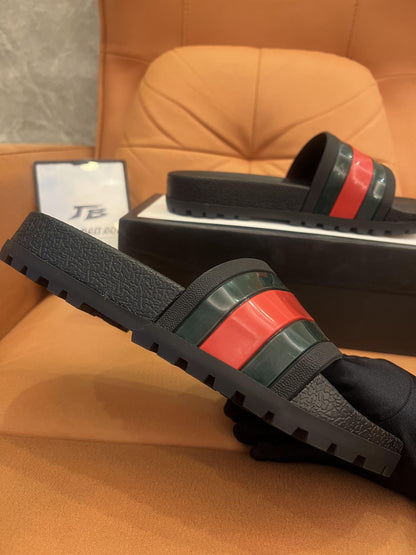 Gucci rubber slide sandals with signature web stripe