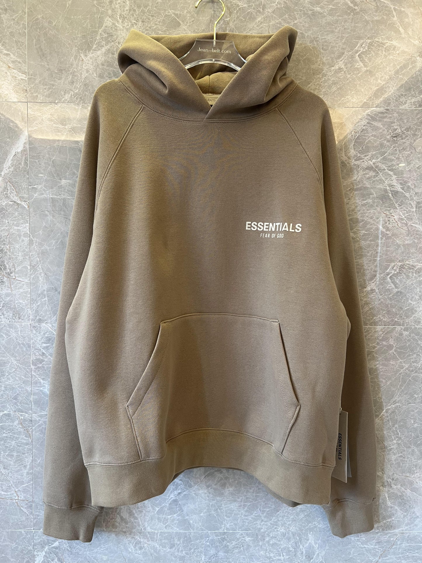 Fear of God Essentials hoodie in taupe