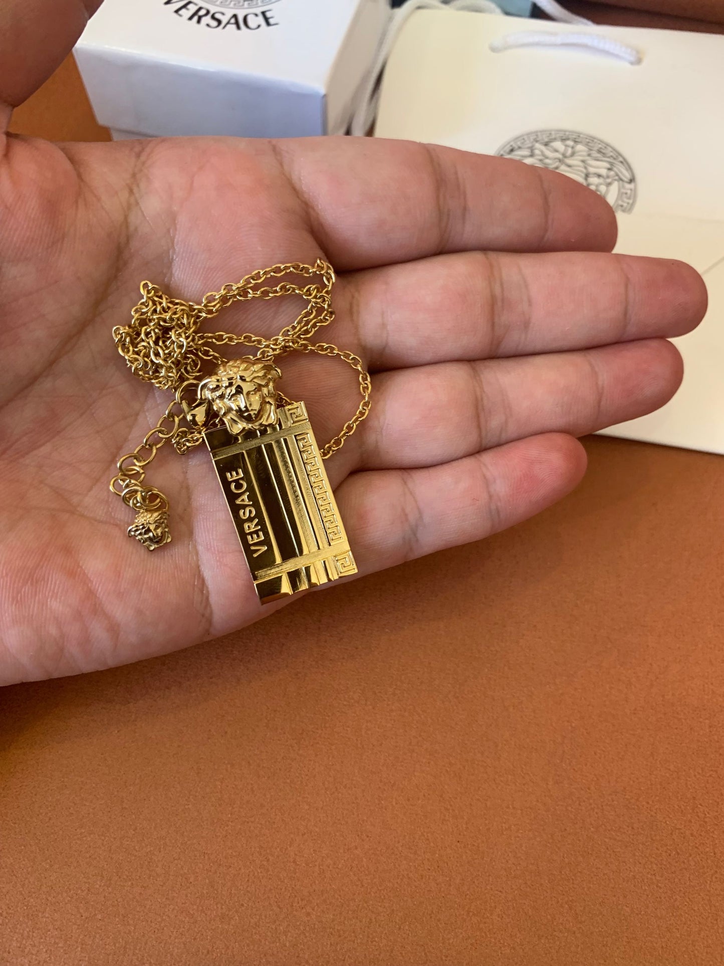 Versace gold-tone medusa pendant necklace