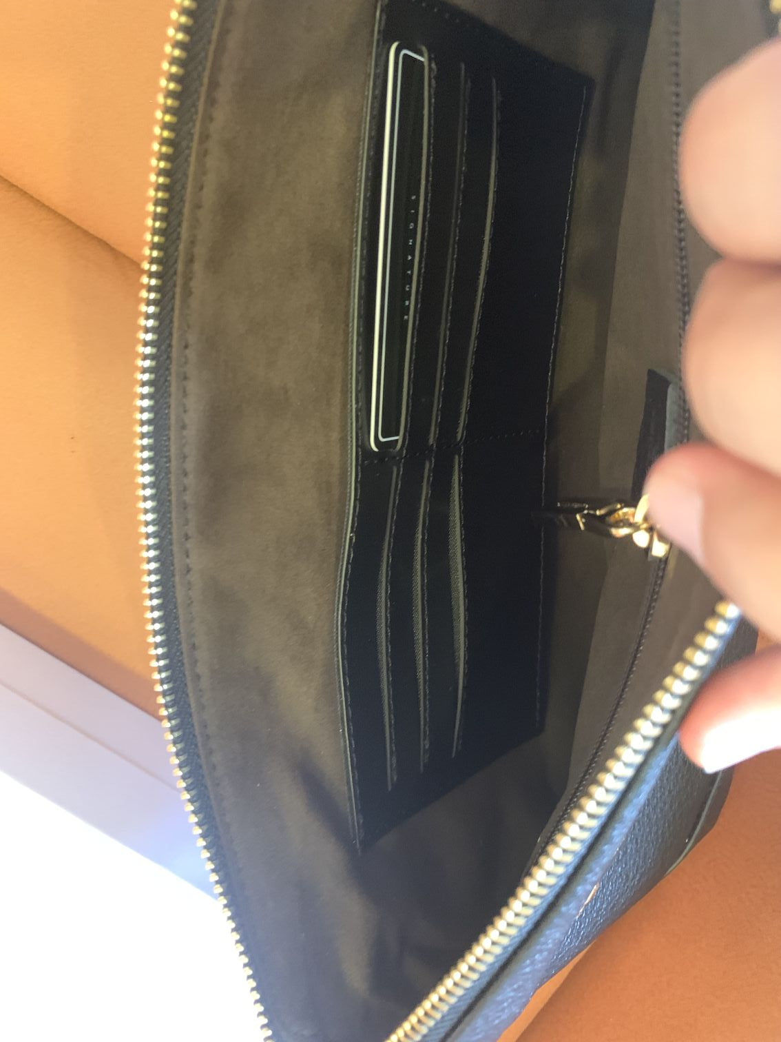 Versace leather medusa zip clutch