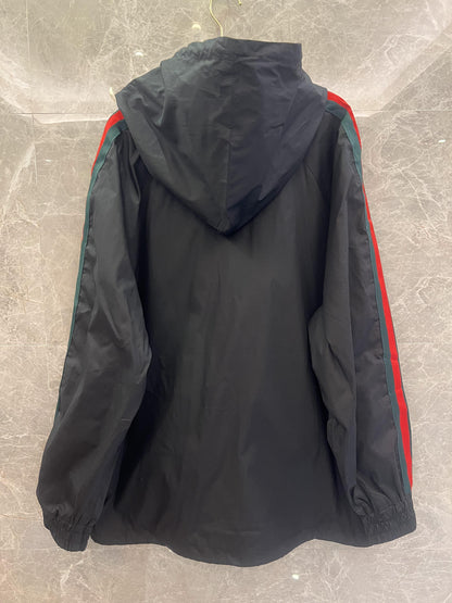 Gucci black hooded jacket with signature stripe detail