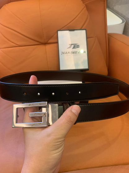 Gucci black leather belt with silver GG buckle