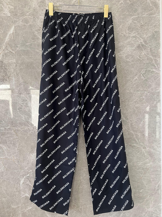 Balenciaga all-over logo track pants in black