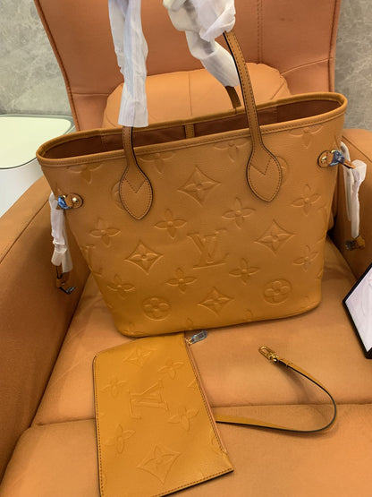 Louis Vuitton empreinte giant neverfull mm cognac limited edition