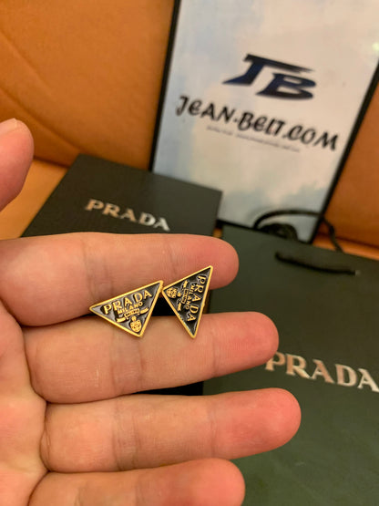 Prada Triangle logo stud earrings in black and gold