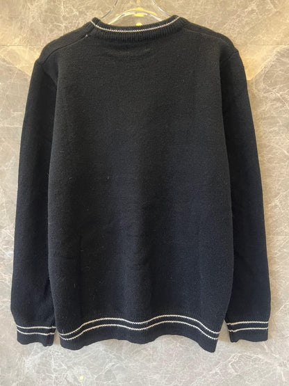 Christian Dior black knit sweater with star accent