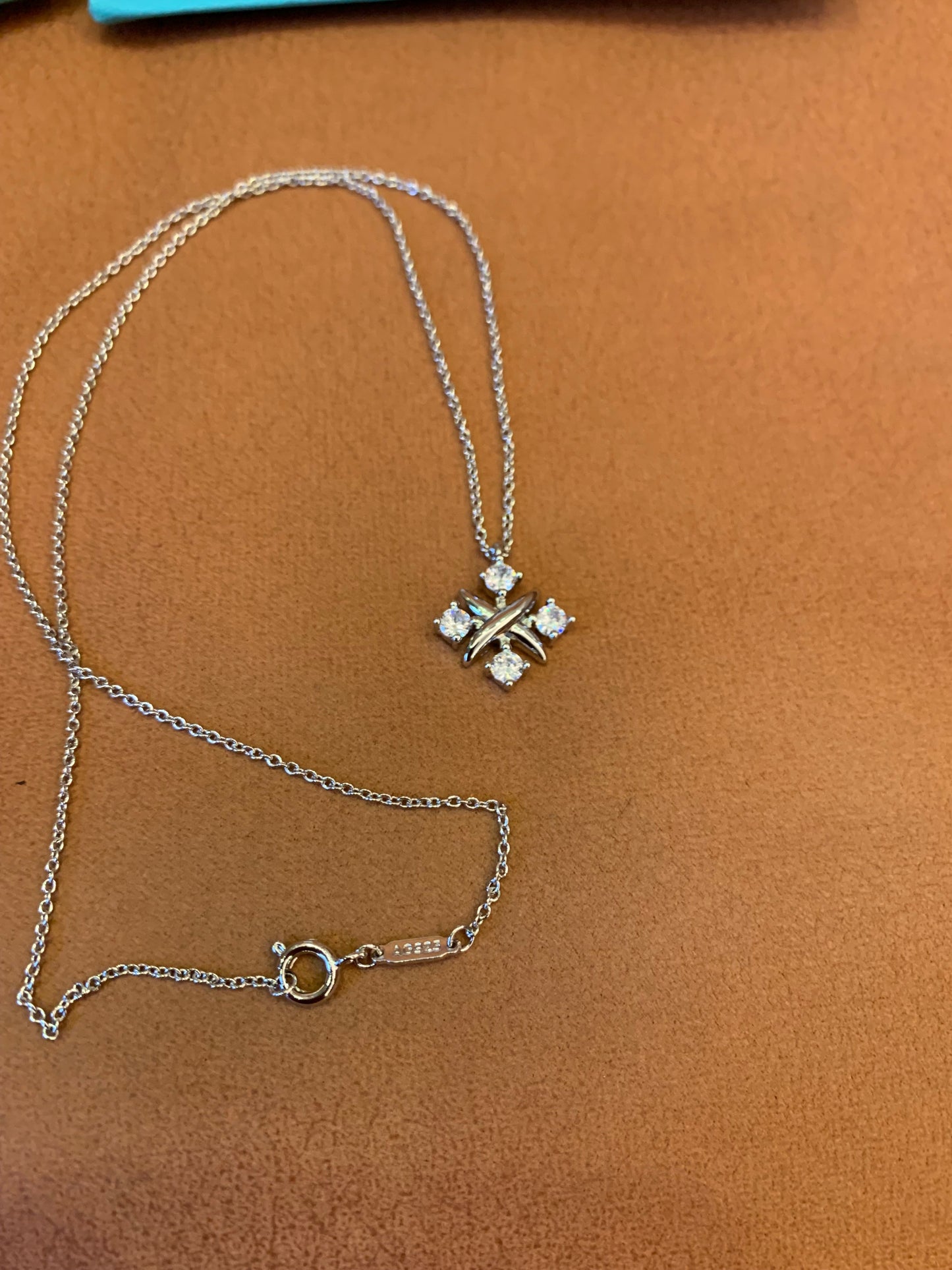 Tiffany & Co. diamond cross pendant necklace