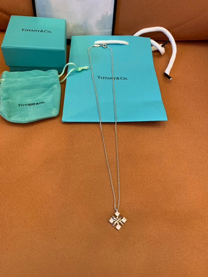 Tiffany & Co. diamond cross pendant necklace