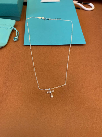 Tiffany & Co. Elsa Peretti™ sterling silver cross pendant necklace