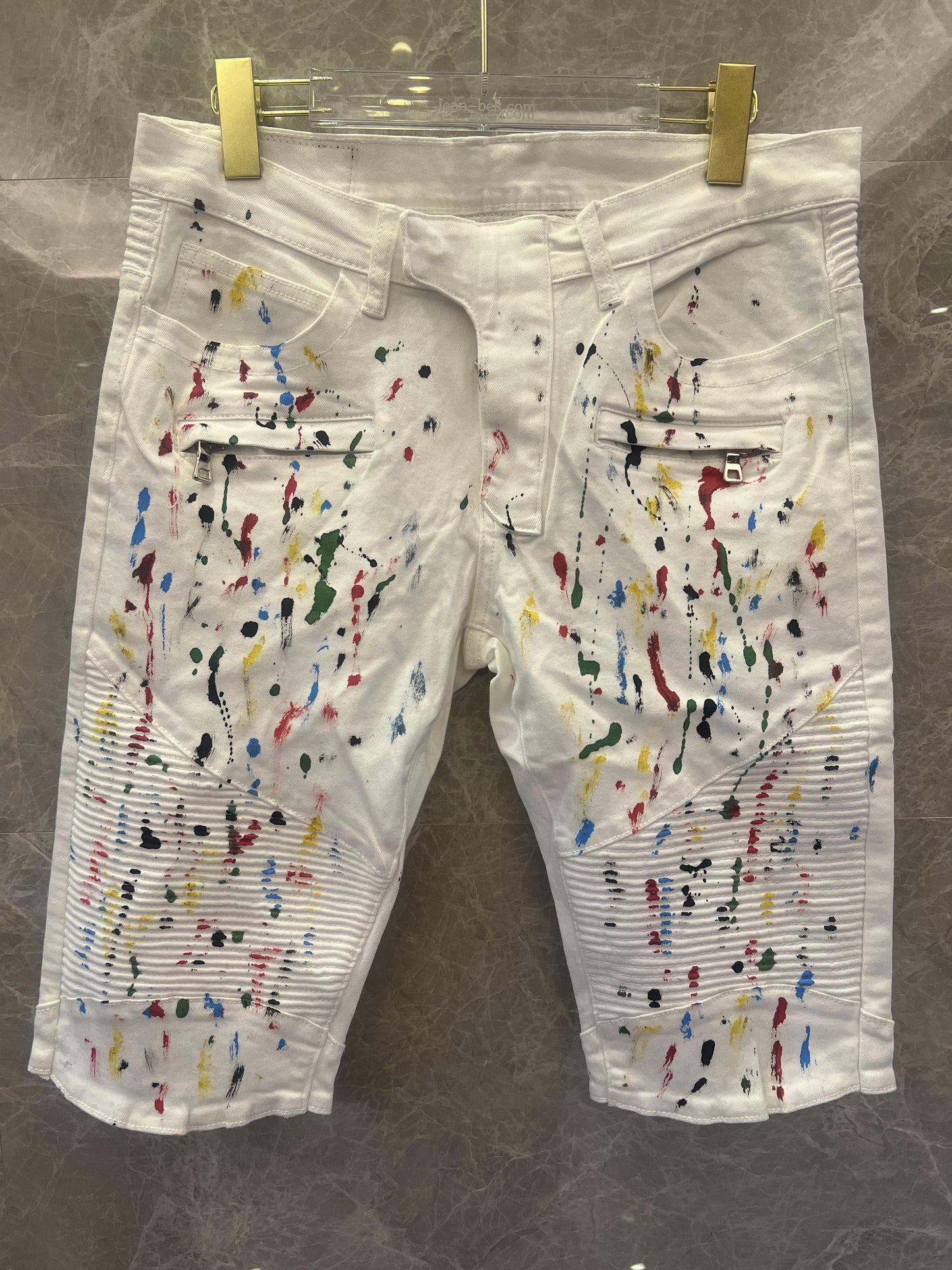 Balmain paint-splattered white denim shorts