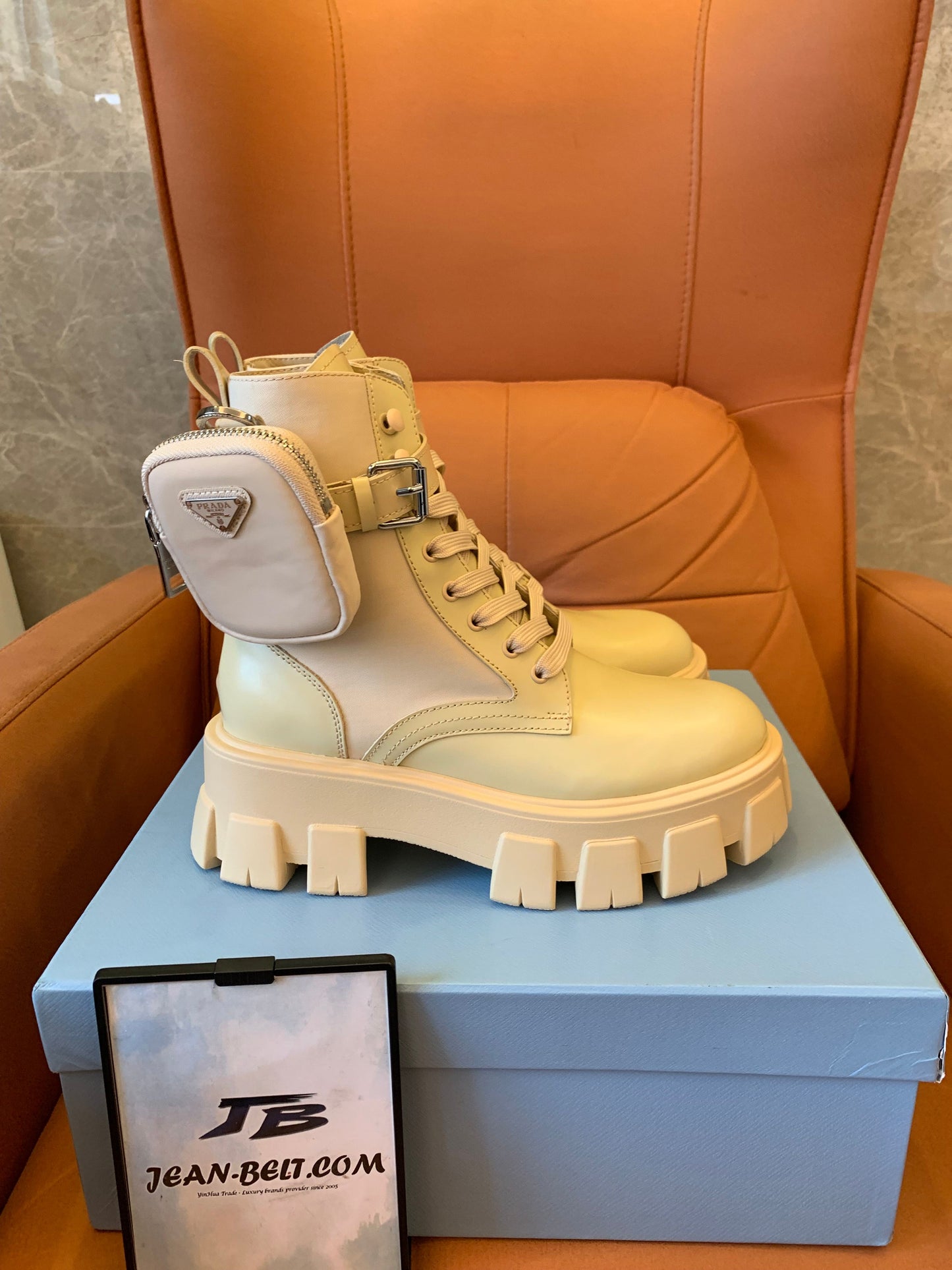 Prada ‘Monolith' platform leather combat boots with detachable pouch