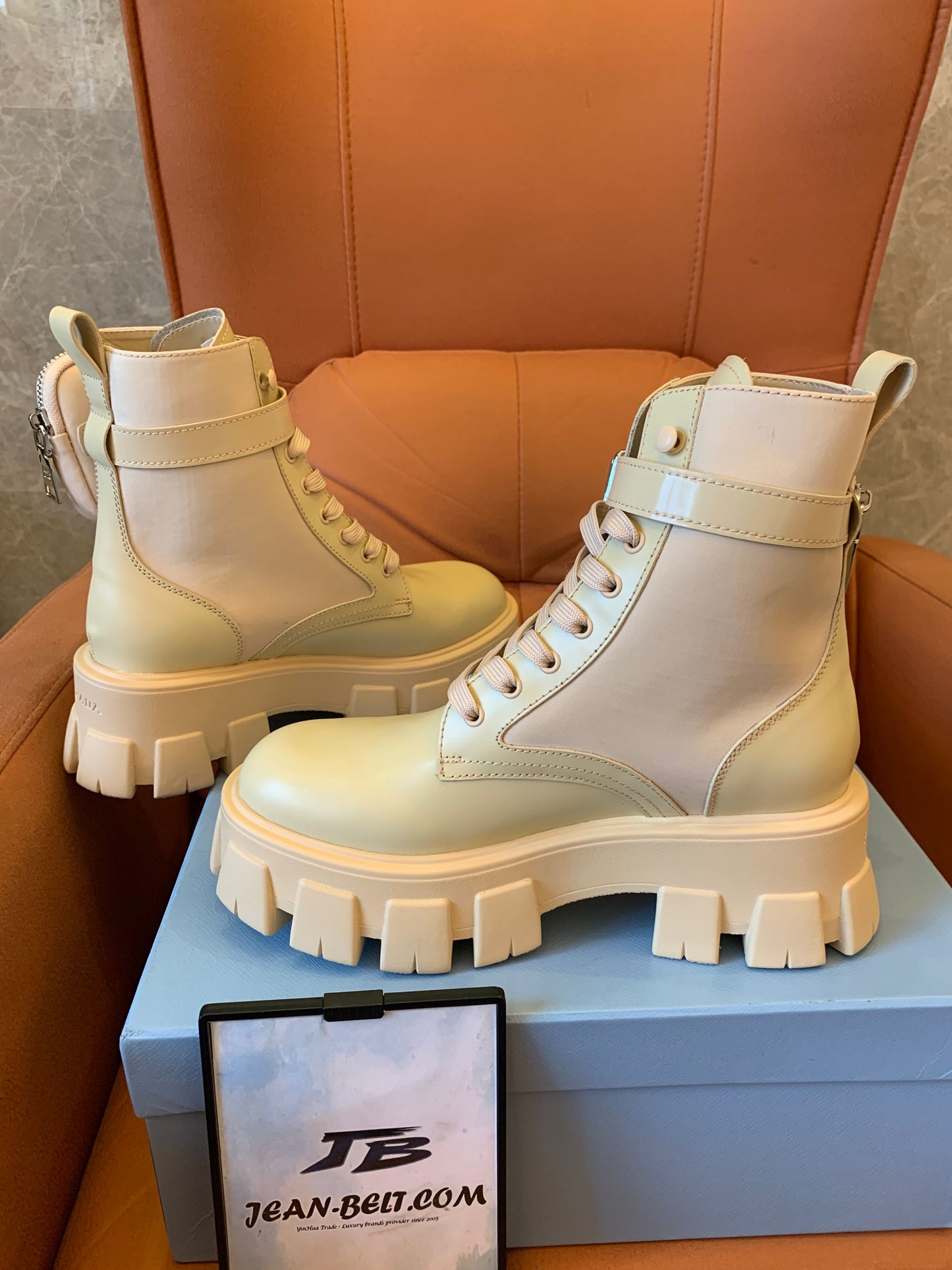 Prada ‘Monolith' platform leather combat boots with detachable pouch