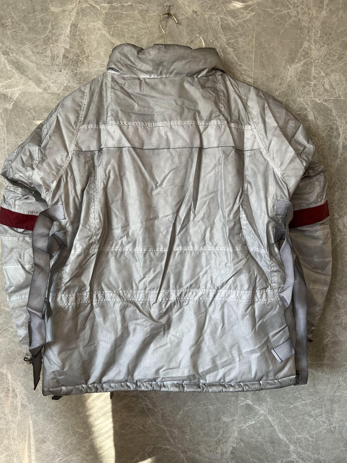 Balenciaga x NASA space-inspired silver jacket with appliqué patches