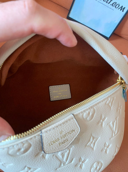 Louis Vuitton empreinte bum bag creme white