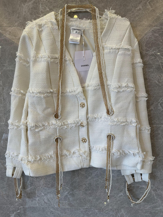 Chanel frayed tweed cardigan with pearl and chain embellishments