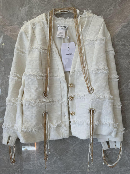 Chanel frayed tweed cardigan with pearl and chain embellishments