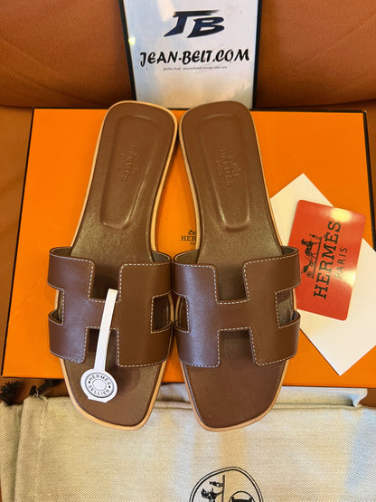 Hermès Oran sandals - brown and green leather slides, classic "H" design