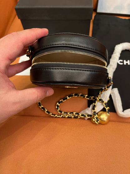 Chanel petite round cross-body bag