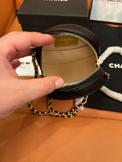 Chanel petite round cross-body bag