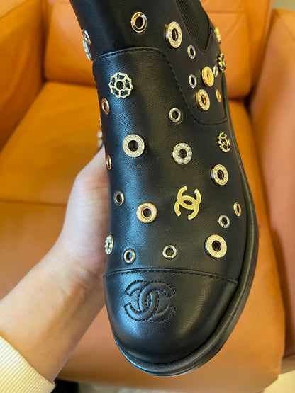 Chanel lambskin riveted cap toe short boots