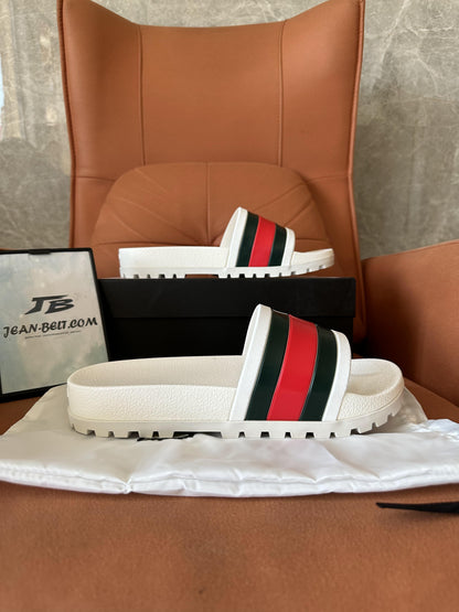 Gucci white rubber slides with web stripe