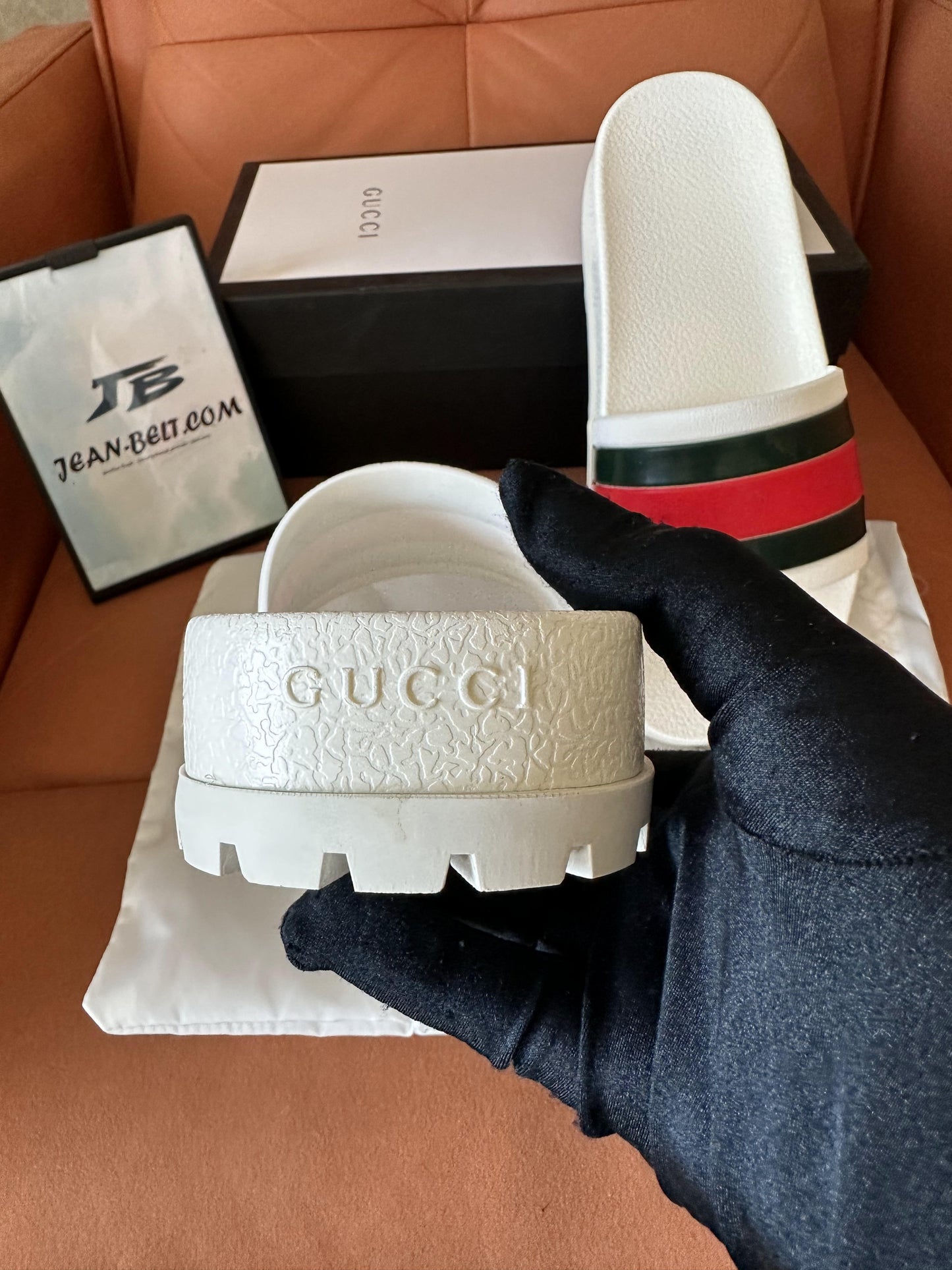 Gucci white rubber slides with web stripe