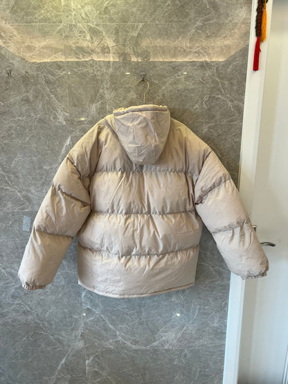 Hermes beige puffer jacket with hood and iconic logo patch