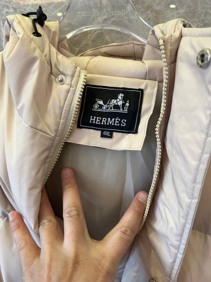 Hermes beige puffer jacket with hood and iconic logo patch