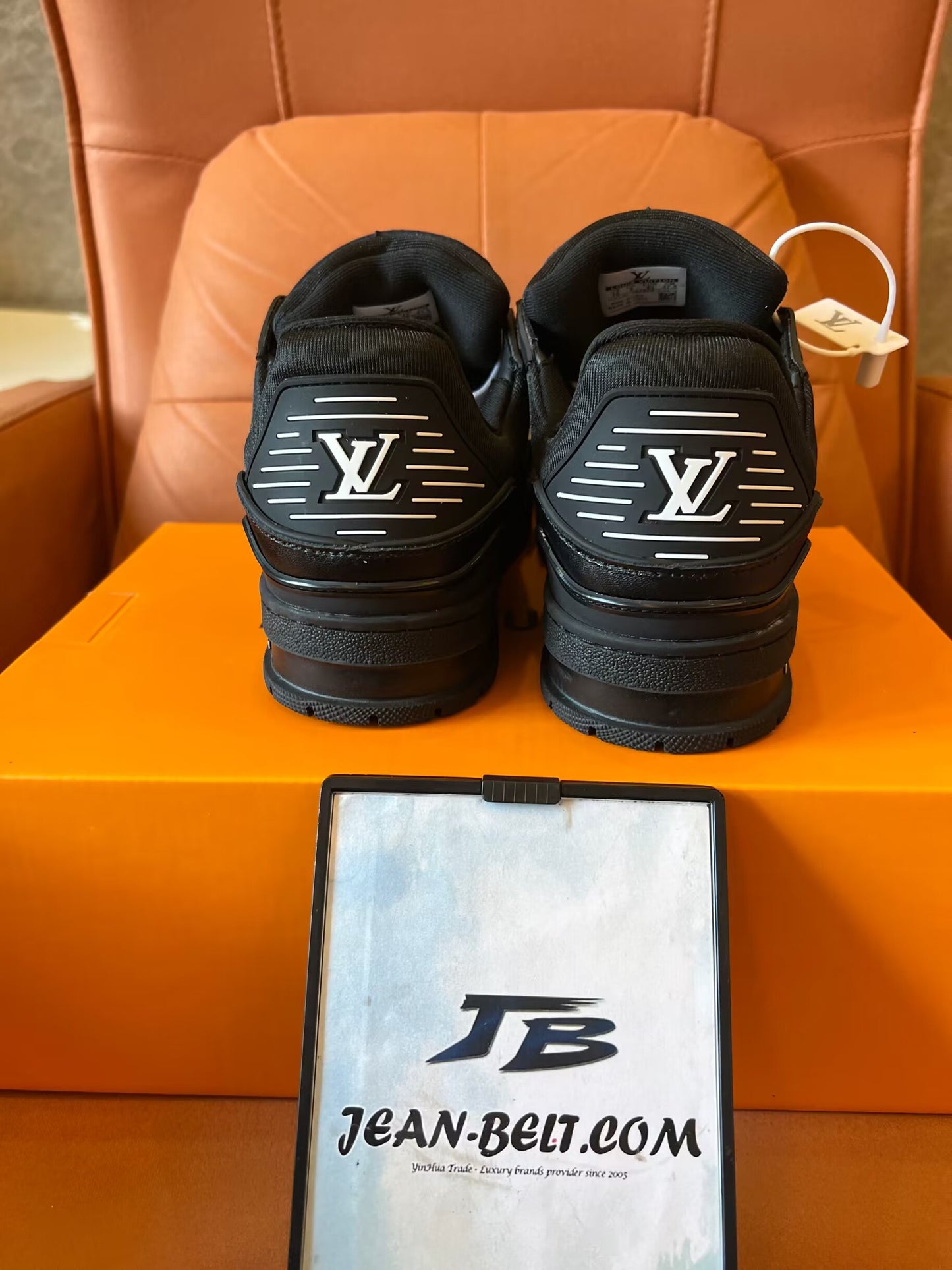 Louis Vuitton Trainer black embossed monogram