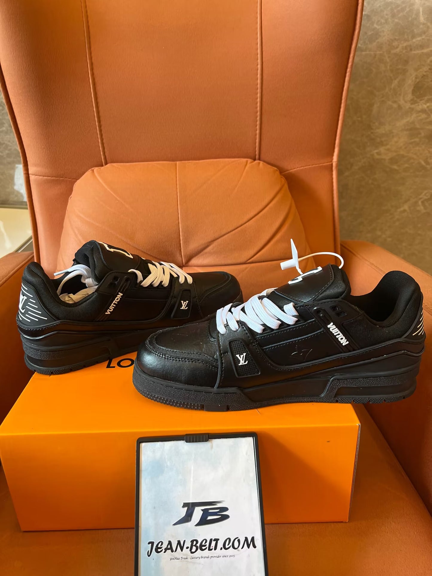 Louis Vuitton Trainer black embossed monogram