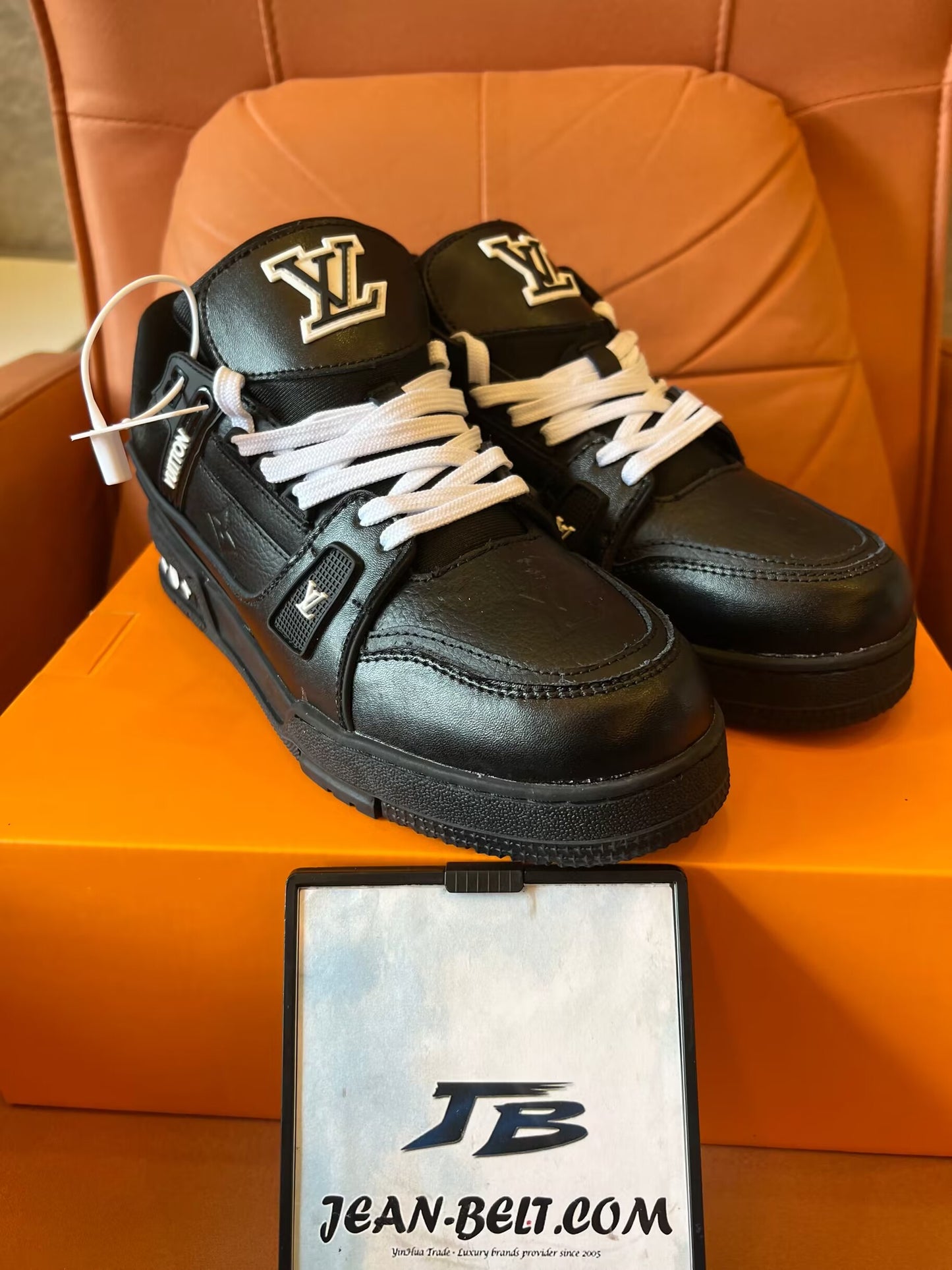 Louis Vuitton Trainer black embossed monogram