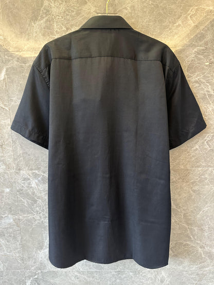 Burberry black short-sleeve shirt with iconic plaid "B" logo