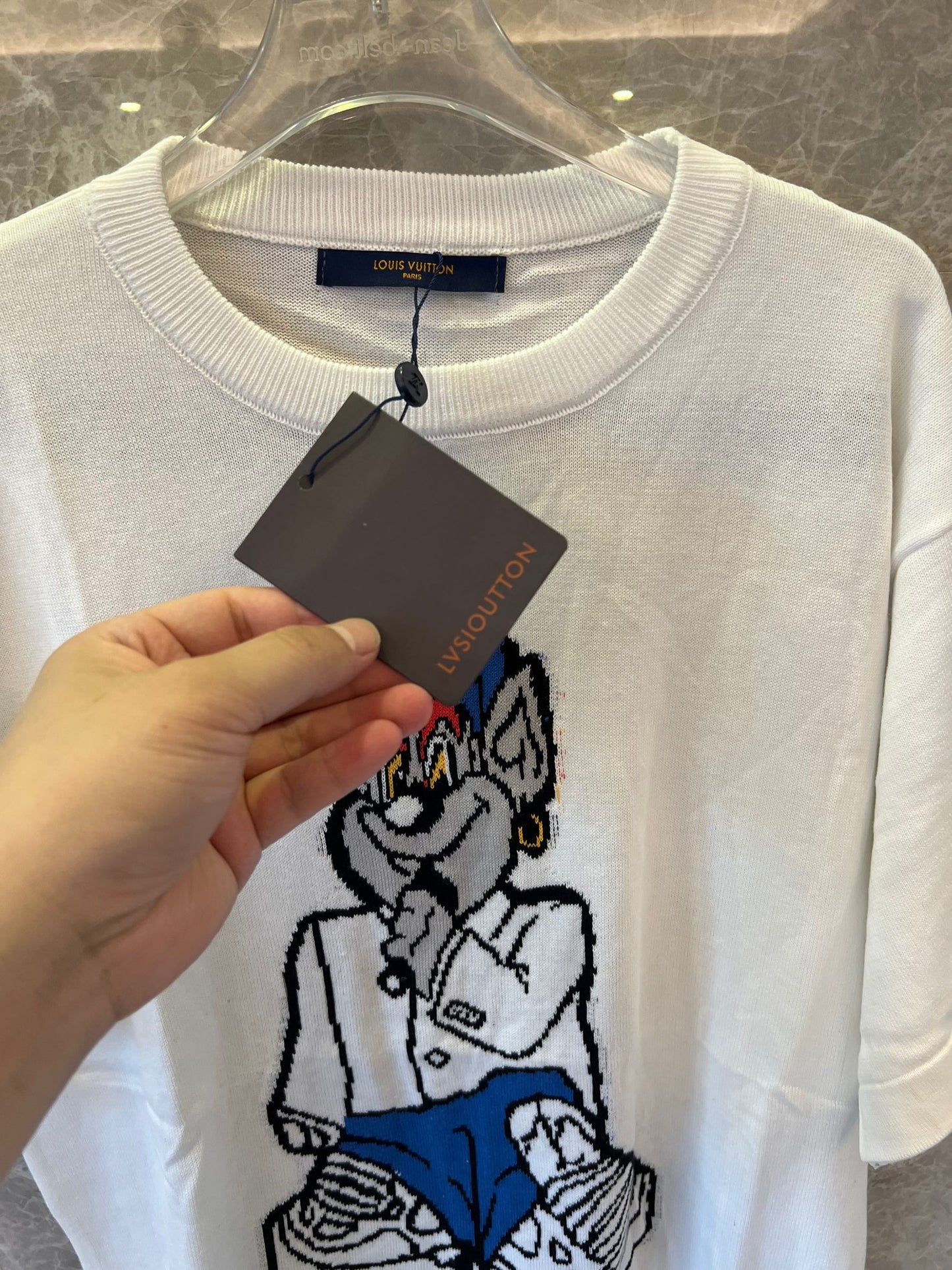 Louis Vuitton white t-shirt with embroidered logo and cartoon graphic