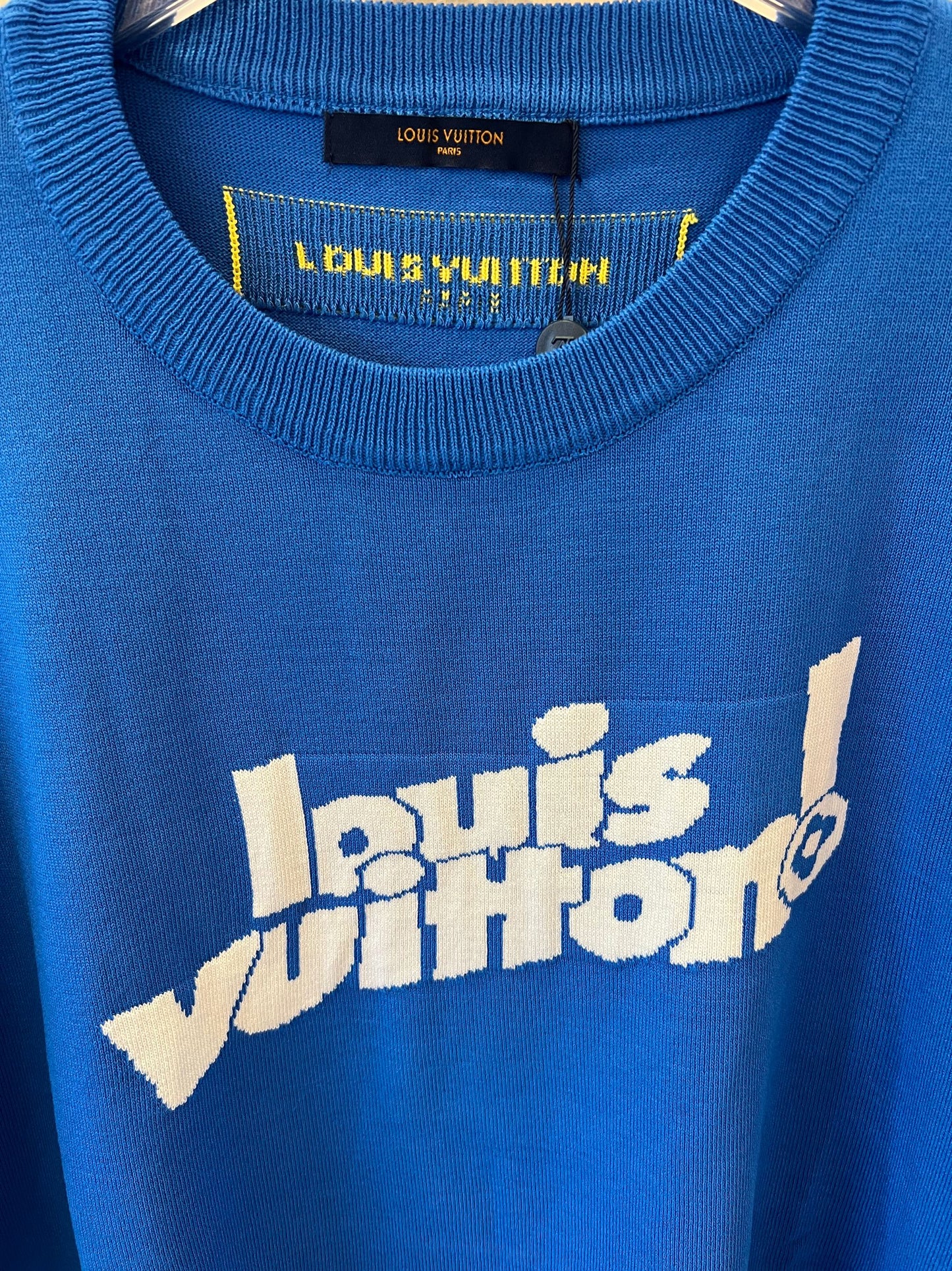 Louis Vuitton blue t-shirt with "Louis vuitton!" front logo and yellow Paris tag